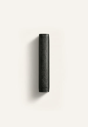 Side view of Amaani black leather Quran cover with embossed Islamic pattern