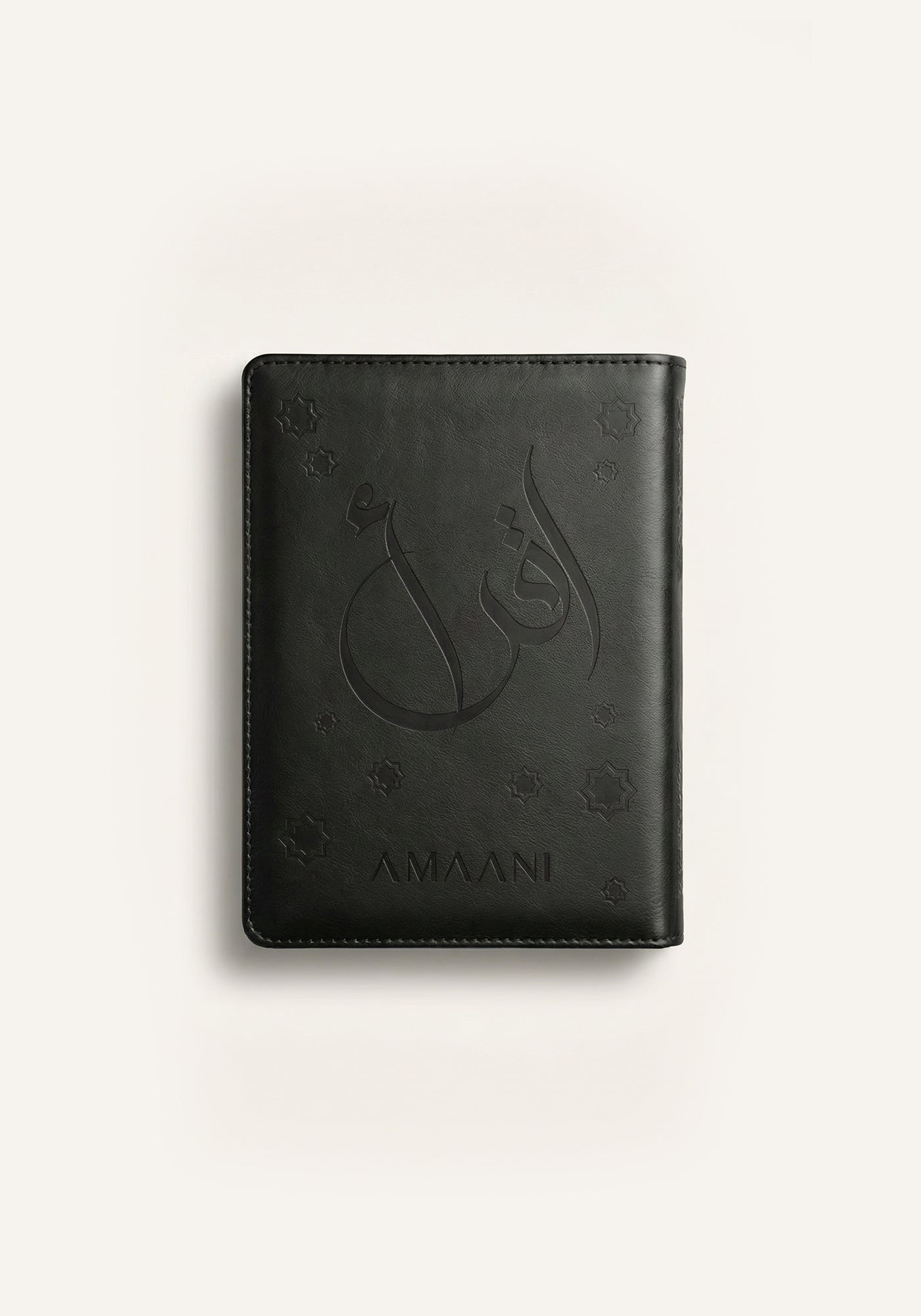 Amaani black leather Quran cover with embossed Arabic calligraphy design
