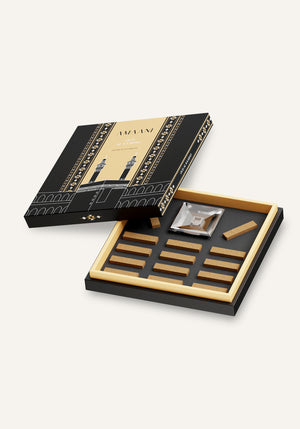 Amaani Oud Al Kaabah premium oud bricks arranged inside black and gold Islamic gift box with crystal burner