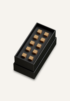 Amaani Oud Al Kiswah oud bricks displayed inside luxury black and gold refill box, Islamic incense