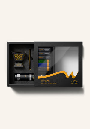 Open Sakinah Ritual Bakhoor Set - Hijaz gift box in black revealing the bakhoor burner, gold tongs and Sakinah premium charcoal, a ready to give Islamic gift