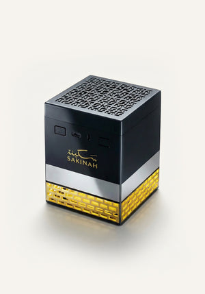 Sukoon Bakhoor Quran Speaker by Sakinah placed on surface, combining Quran recitation and bakhoor aroma