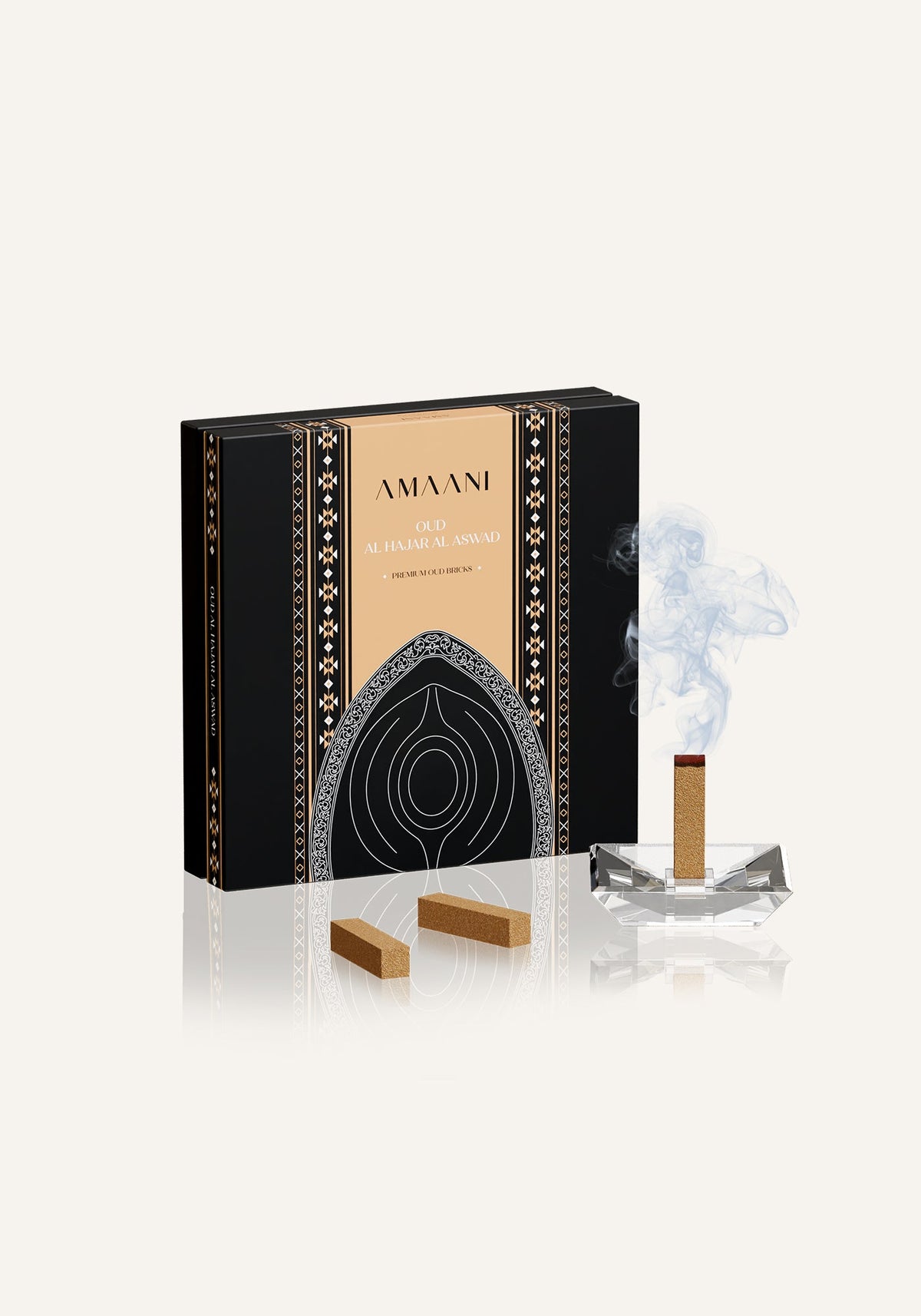 Amaani Oud Al Hajar Al Aswad oud bricks with a lit brick