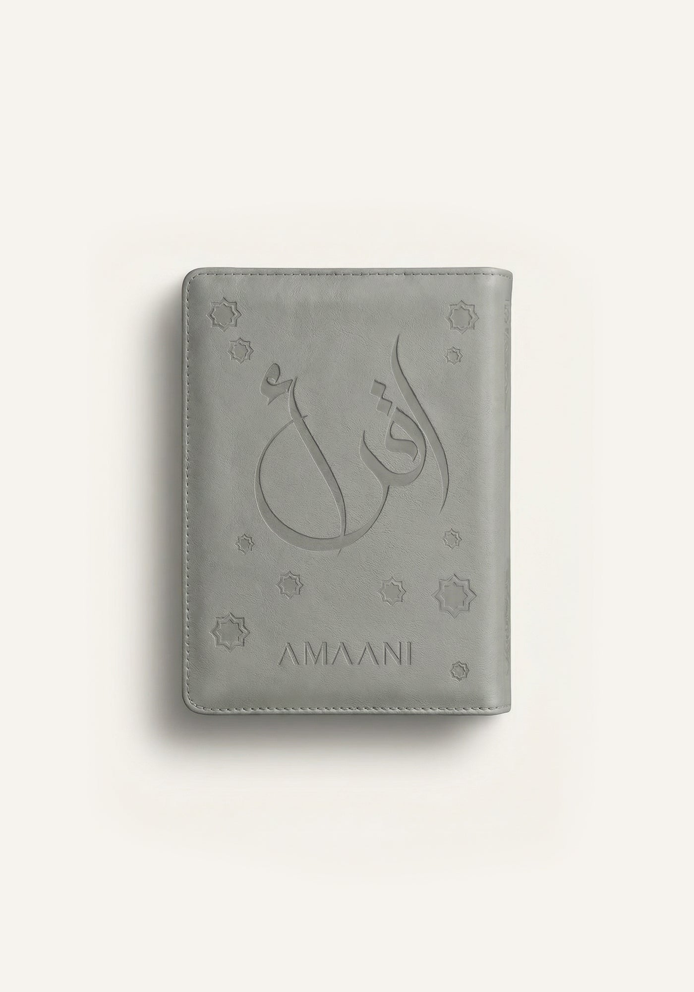 Amaani grey leather Quran cover with embossed Arabic calligraphy design