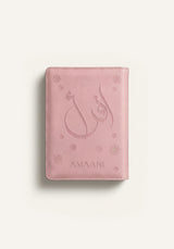 Amaani pink leather Quran cover with embossed Arabic calligraphy design