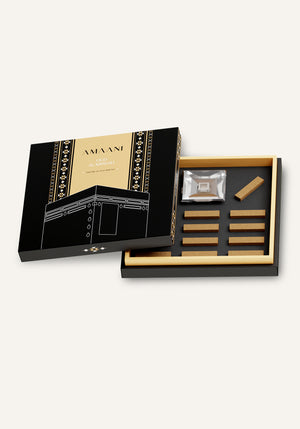 Amaani Oud Al Kiswah premium oud bricks gift set showcasing open and closed Islamic black and gold packaging