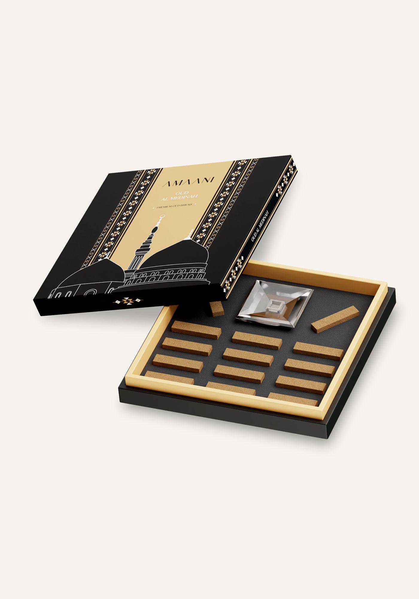 Amaani Oud Al Medinah premium oud bricks arranged inside luxury presentation gift box with bakhoor burner