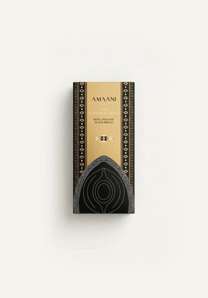 Amaani Oud Al Hajar Al Aswad oud bricks refill package with black and gold Islamic-inspired luxury packaging