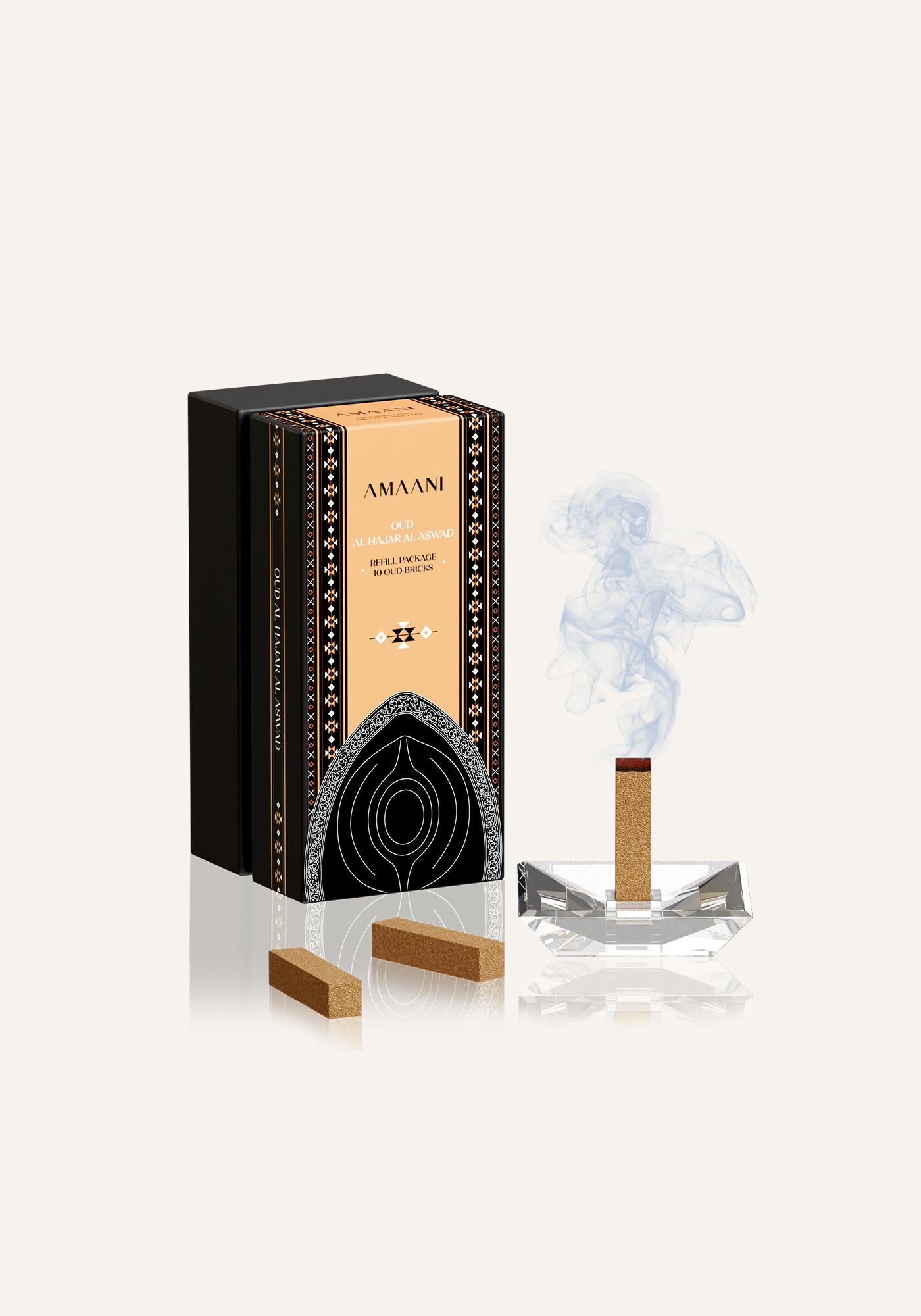 Amaani Oud Al Hajar Al Aswad oud brick burning on crystal bakhoor burner with soft incense smoke