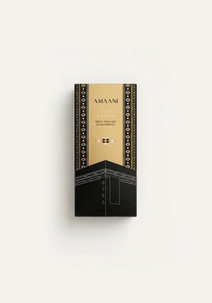 Amaani Oud Al Kiswah bakhoor refill package with black and gold Islamic design, premium oud incense bricks