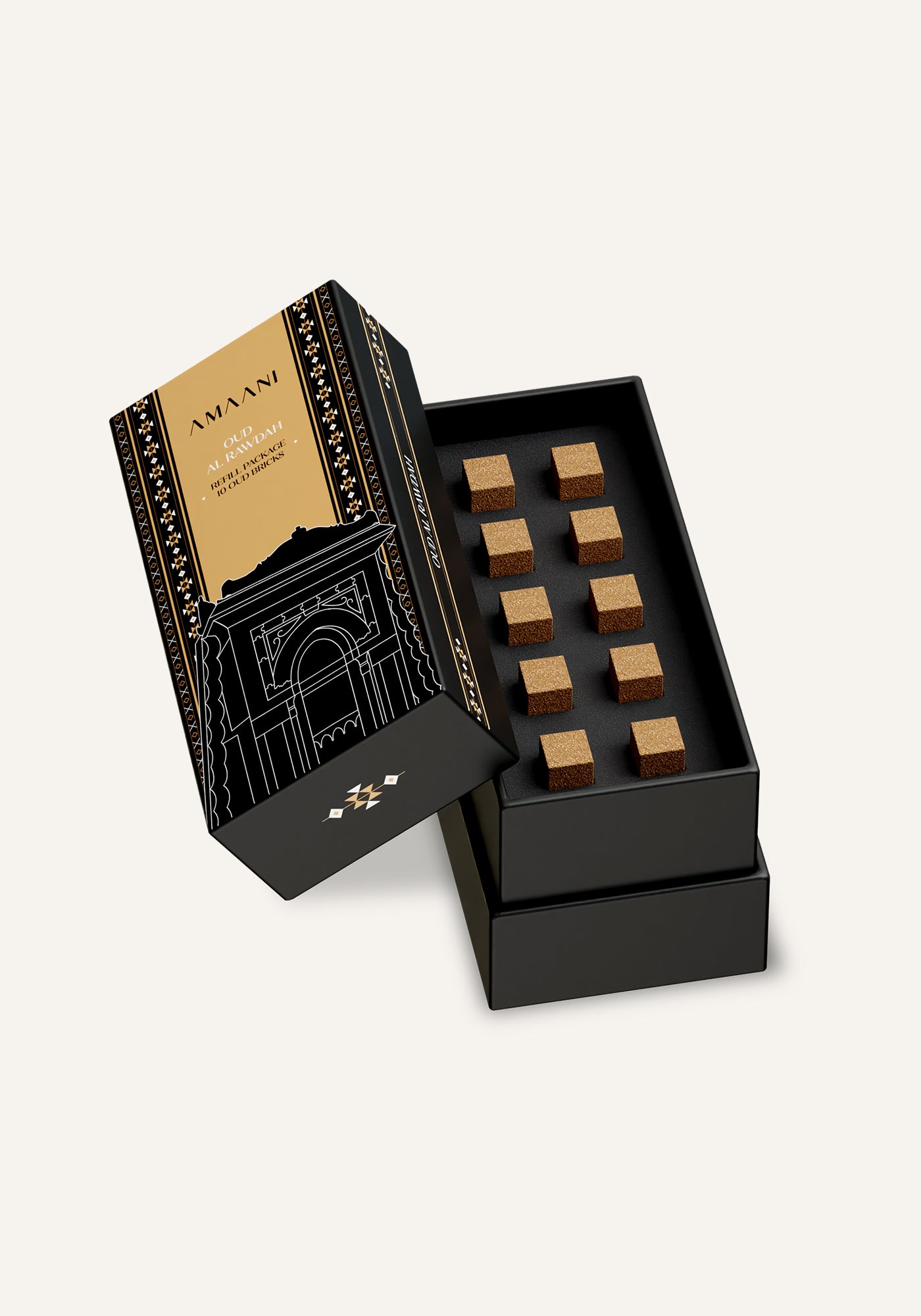 Amaani Oud Al Rawdah oud bricks refill gift box opened showing ten premium oud bricks arranged inside