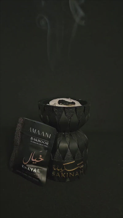 Sakinah Ritual Bakhoor Set Layali being lit and used at home with Amaani bakhoor