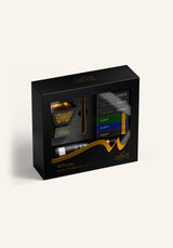 Sakinah Ritual Bakhoor Set - Hijaz in black, a premium bakhoor gift set with a gold-patterned stone burner, six Amaani bakhoor samples, charcoal and gold tongs in a Sakinah gift box