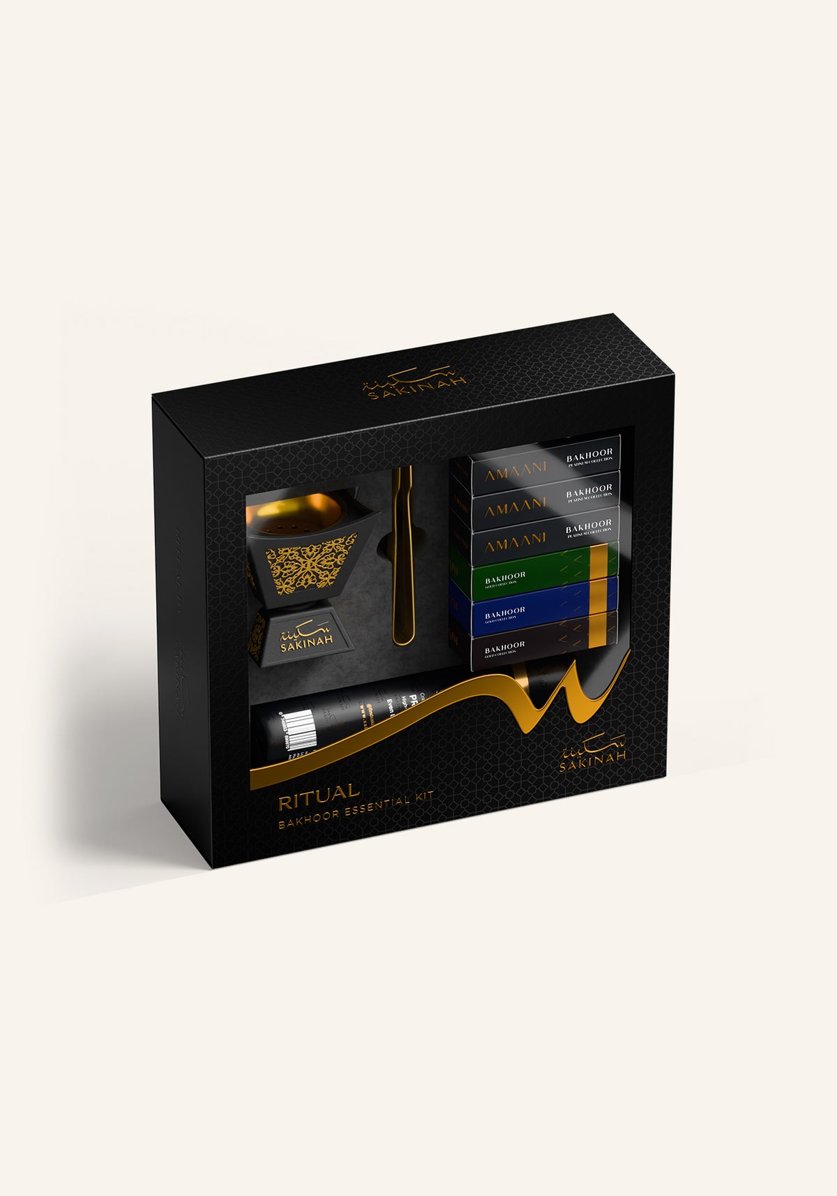Sakinah Ritual Bakhoor Set - Hijaz in black, a premium bakhoor gift set with a gold-patterned stone burner, six Amaani bakhoor samples, charcoal and gold tongs in a Sakinah gift box