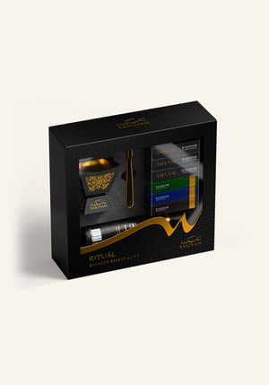 Sakinah Ritual Bakhoor Set - Hijaz in black, a premium bakhoor gift set with a gold-patterned stone burner, six Amaani bakhoor samples, charcoal and gold tongs in a Sakinah gift box