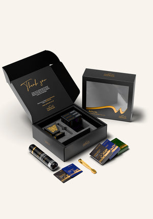 Unboxed black Hijaz bakhoor gift set with Sakinah thank you card, burner, premium charcoal, gold tongs and Amaani bakhoor samples, an ideal bakhoor gift for Eid or Nikah in South Africa