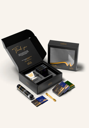 Unboxed white Hijaz bakhoor gift set with Sakinah thank you card, burner, premium charcoal, gold tongs and Amaani bakhoor samples, an ideal bakhoor gift for Eid or Nikah in South Africa
