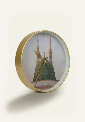 Close-up of Dome of the Prophet ﷺ Islamic wall clock showing gold detailing and numerals